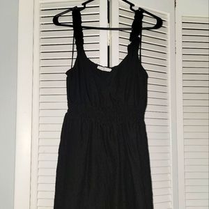 Short black low-cut dress. This was worn once.